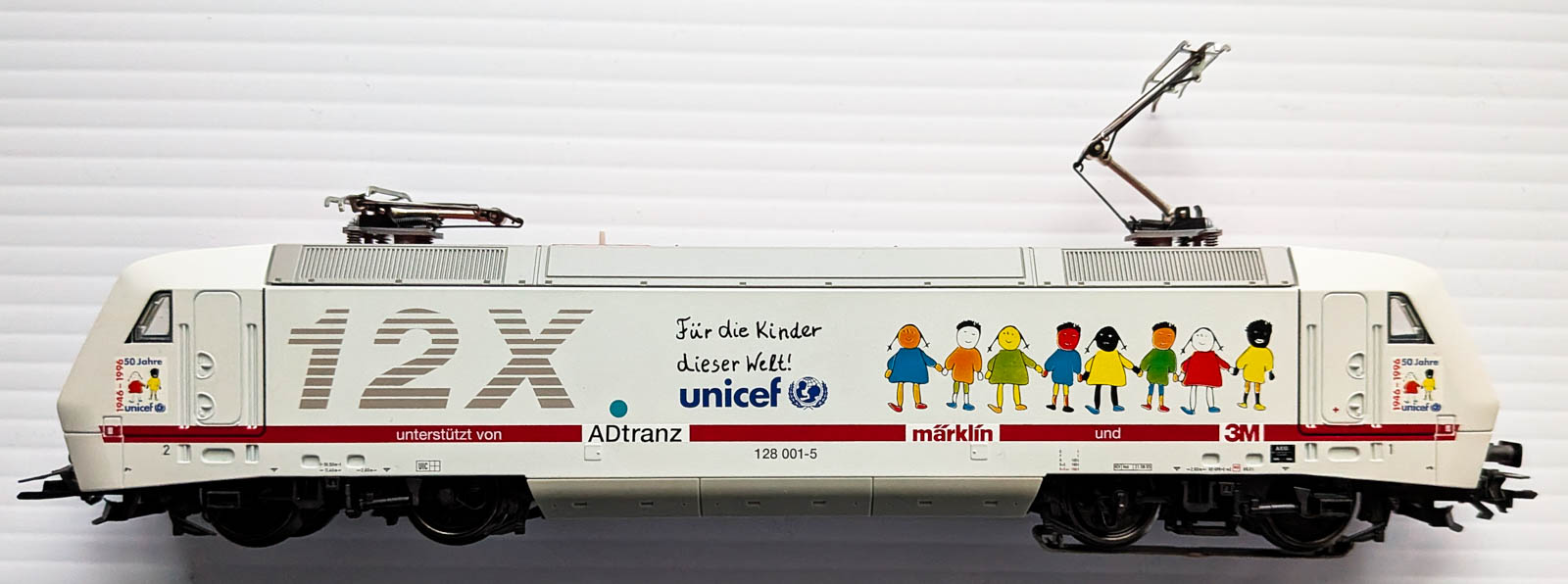Unicef 12X-1 Marklin Märklin HO 37382 BR 128 Unicef Digital Electric Loco - NOS - Image 1